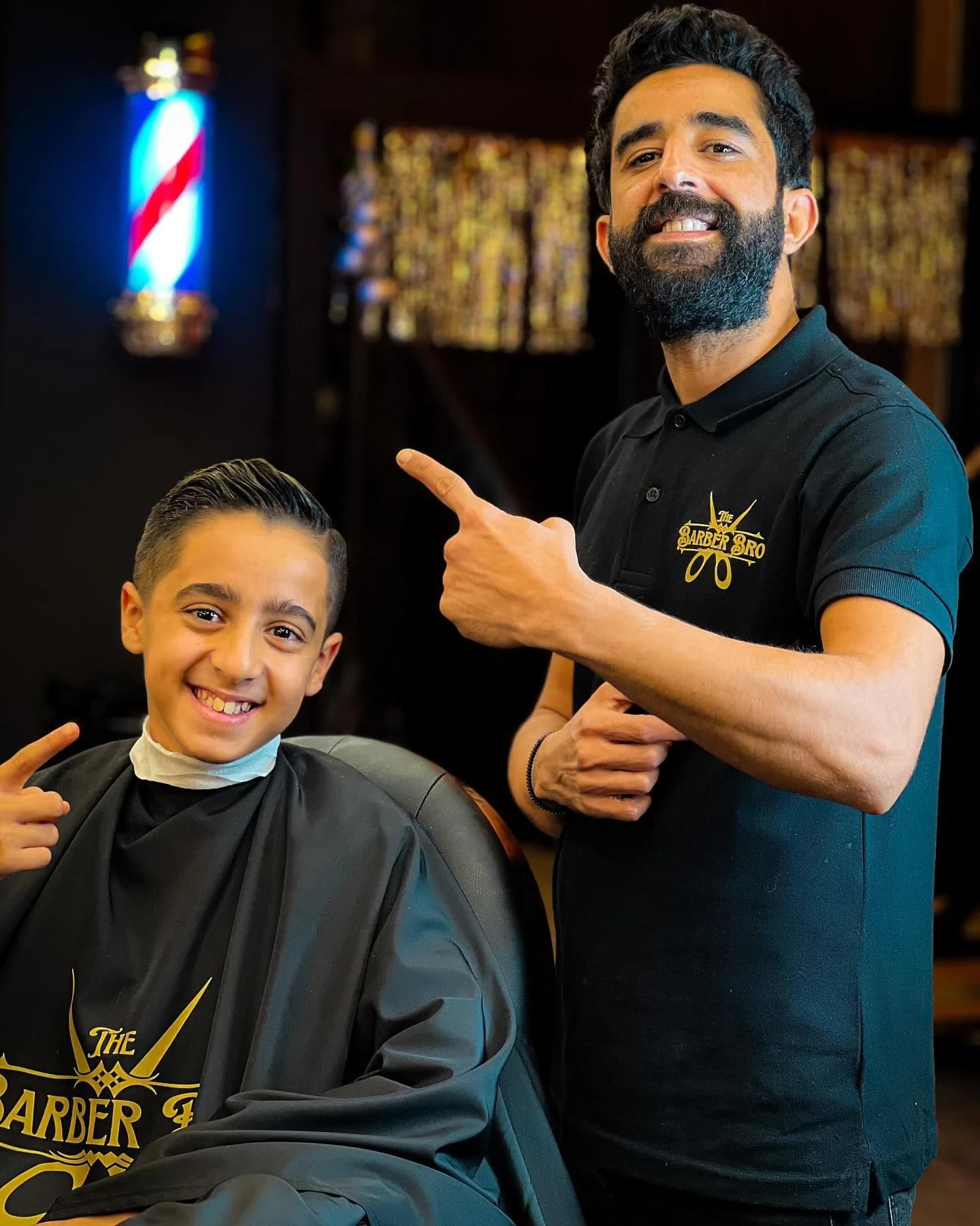 Professional barber performing expert haircut and beard grooming at The Barber Bro in Salé, Morocco