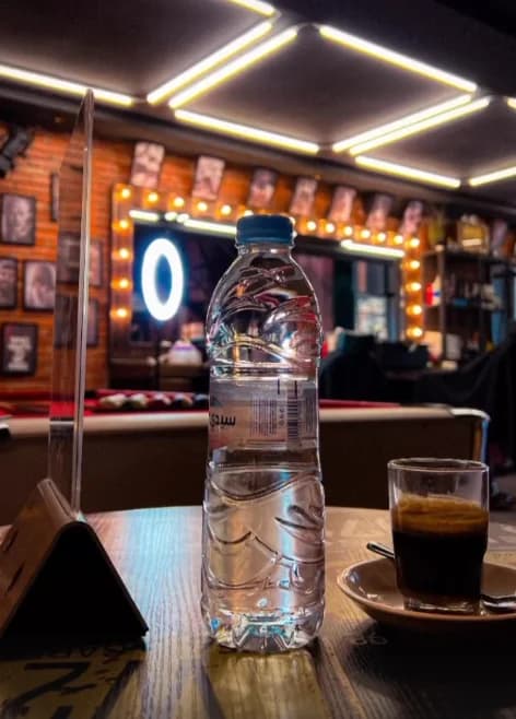 Premium coffee lounge at The Barber Bro barbershop in Salé, Morocco - relax while waiting for your haircut